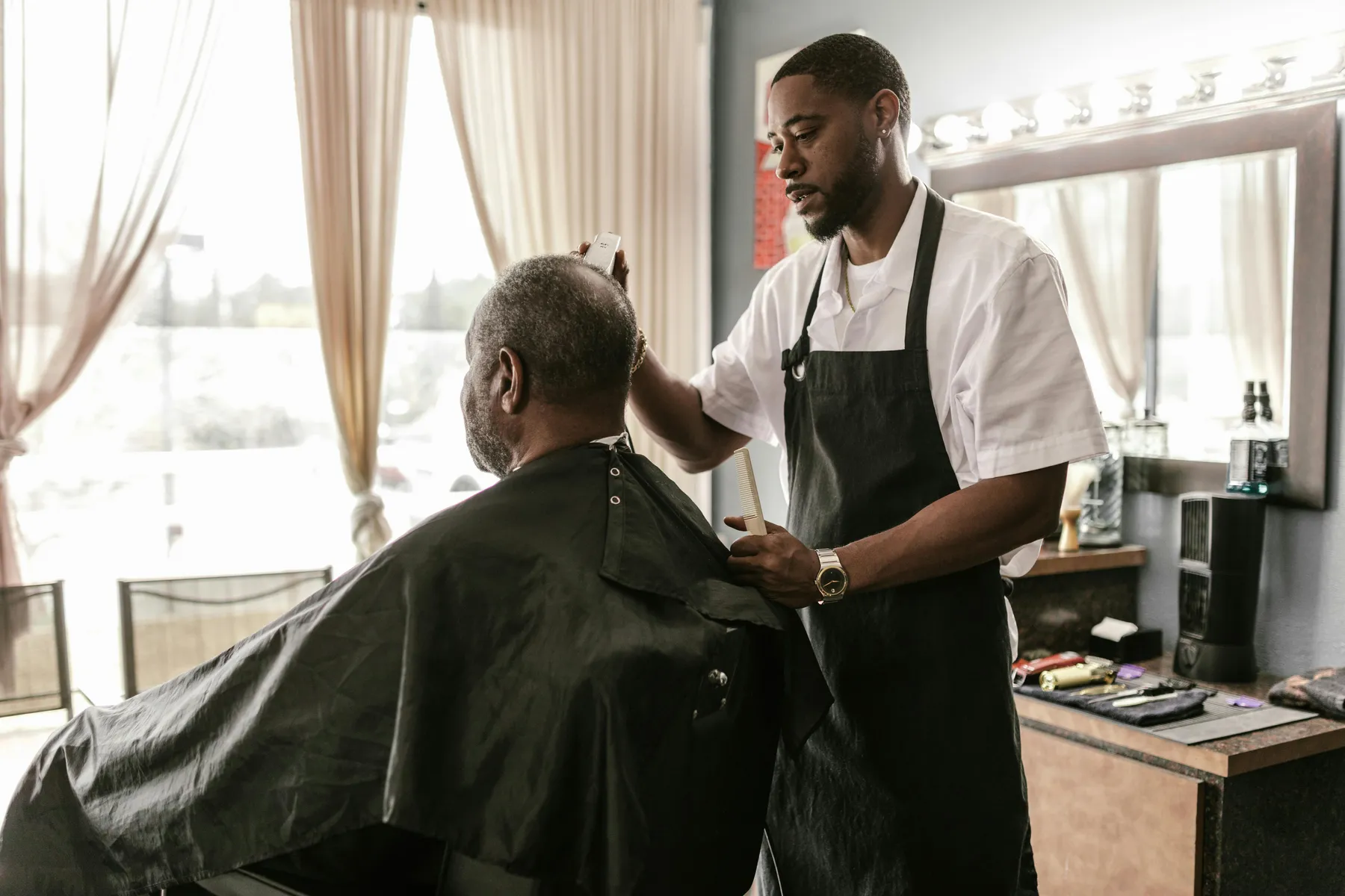 Stylist reviewing a client consult