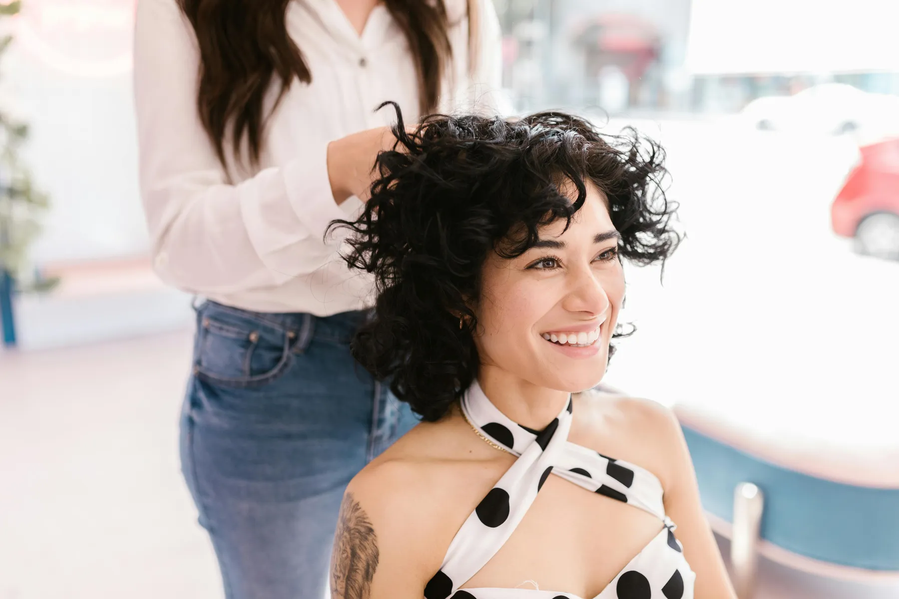 Beauty professional with a client