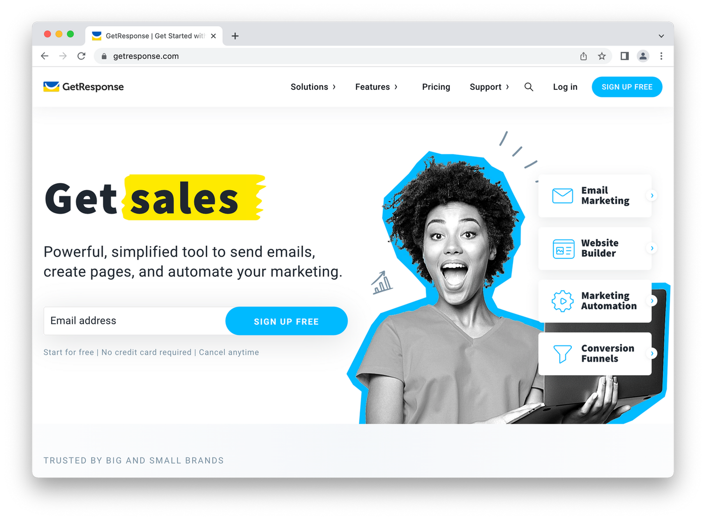 screenshot of getresponse homepage, woman smiling at computer