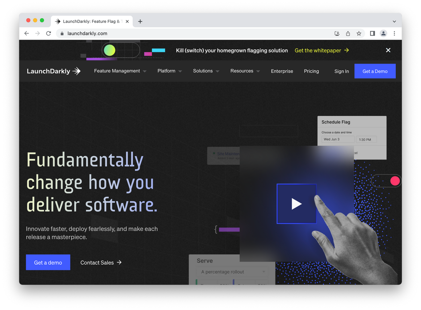 screenshot of launchdarkly homepage, hand tapping play button on dark background
