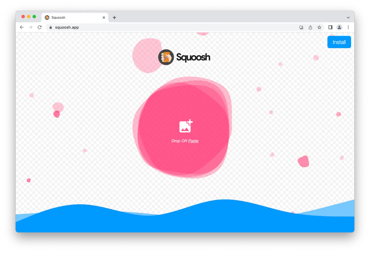 Squoosh homepage, pink circle with drag and drop icon on white background