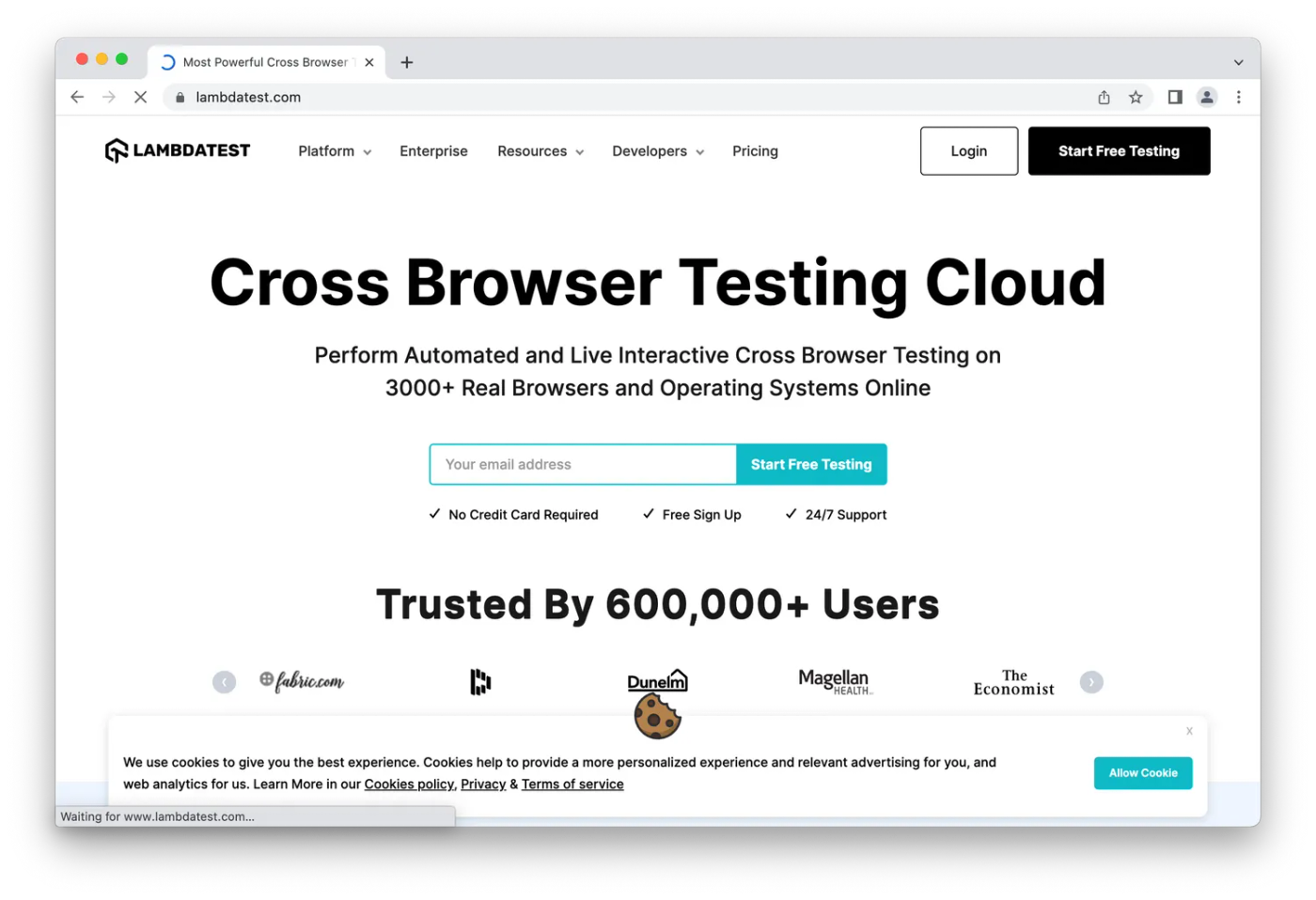 LambdaTest homepage, blue email signup on white background