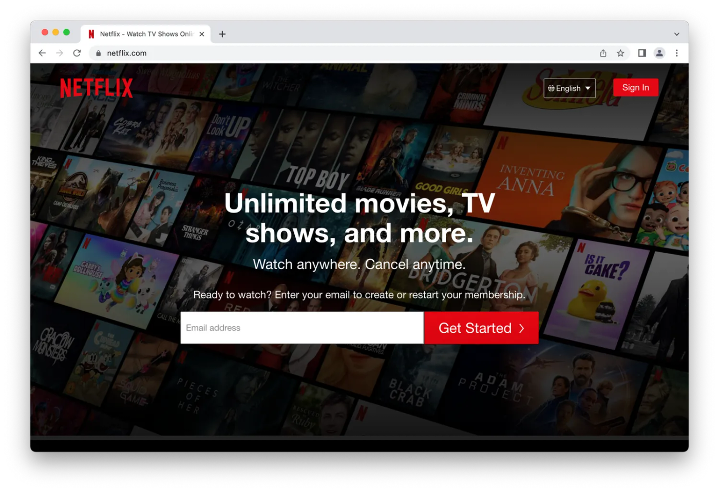 Netflix sign up page, email field over TV and movie titles