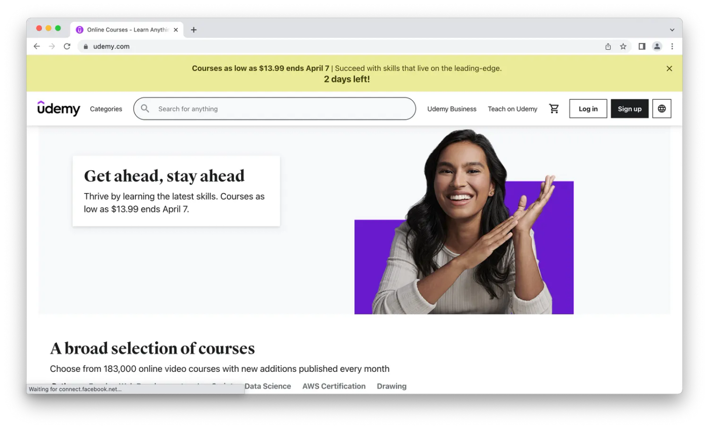 screenshot of udemy website homepage, woman smiling