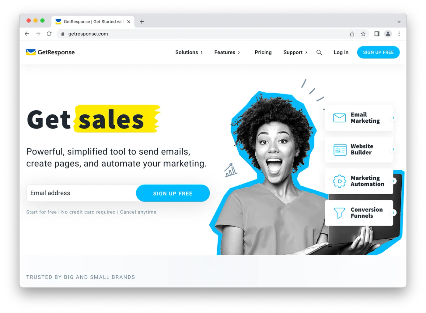 screenshot of getresponse homepage, woman smiling at computer