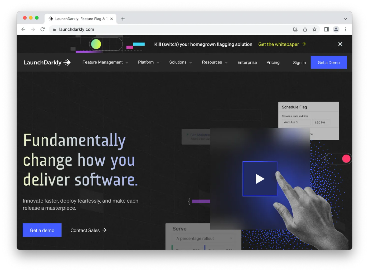 screenshot of launchdarkly homepage, hand tapping play button on dark background